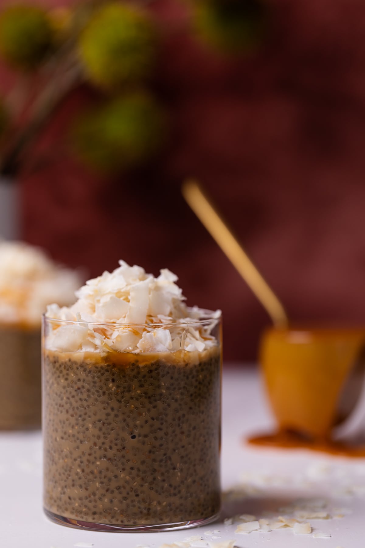 Caramel Macchiato Chia Pudding with Coconut in a glass.