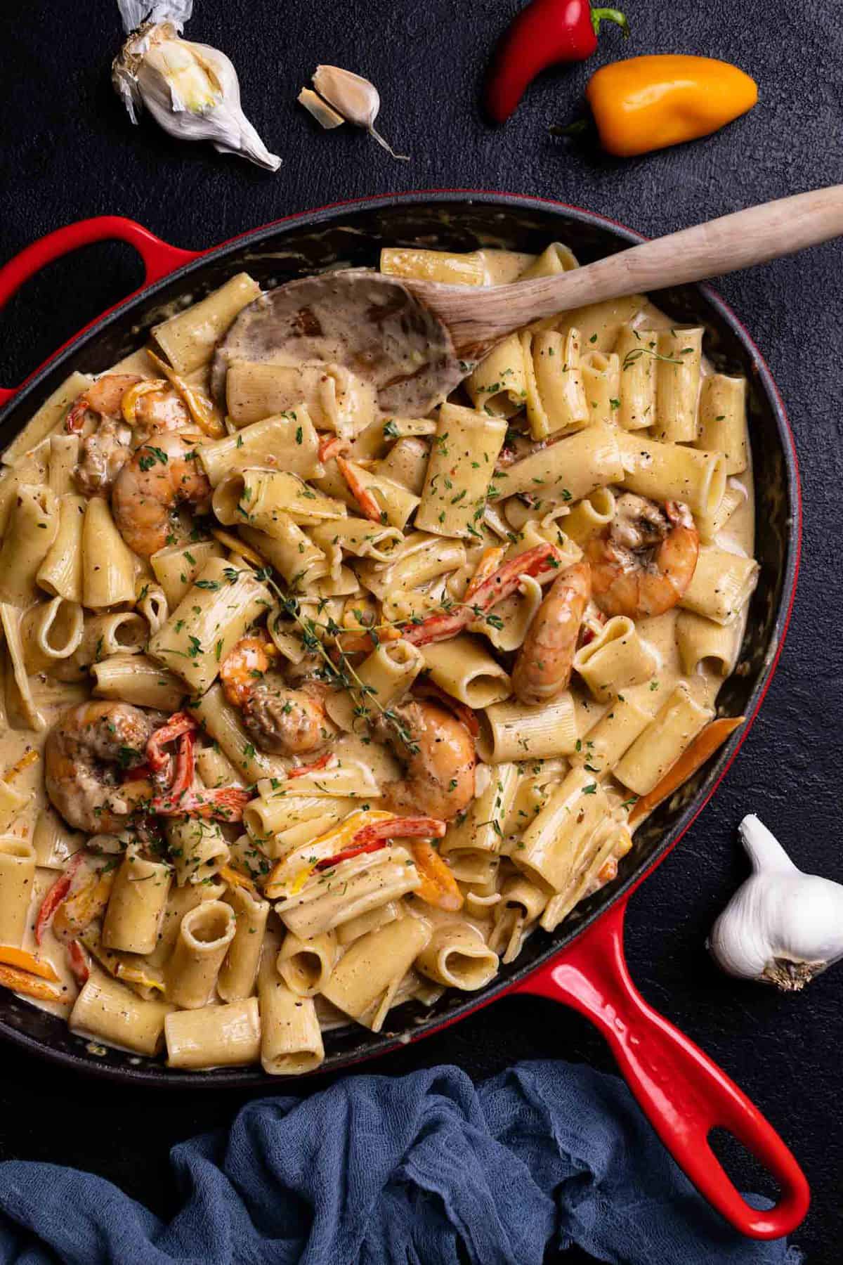 Creamy Jamaican Shrimp Rasta Pasta in an oblong skillet