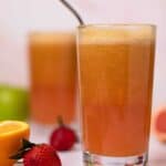 Apple Citrus Strawberry Juice in two glasses with a metal straw
