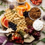 Vegan Brunch Charcuterie Board with fruit, waffles, and more.