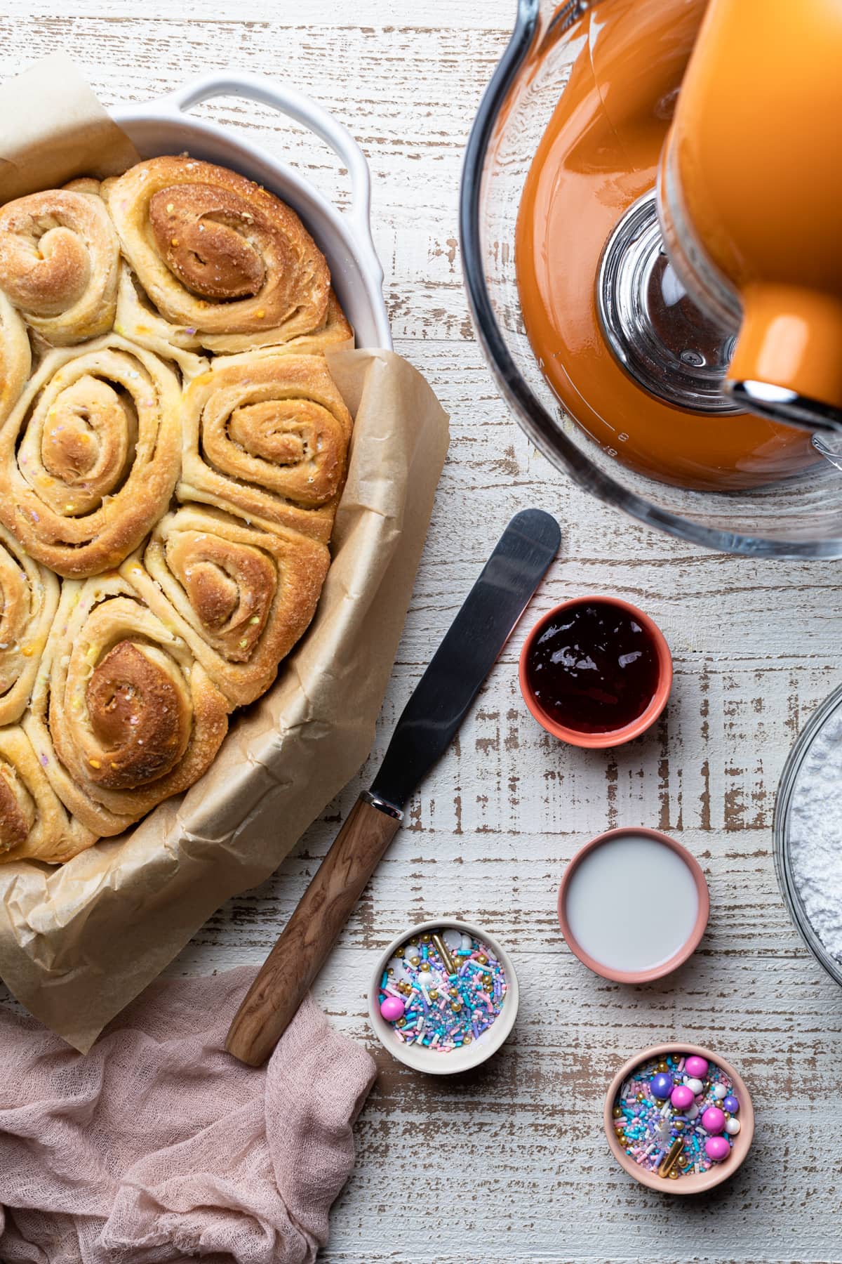 Unfrosted Vegan Funfetti Cinnamon Rolls in a pan.