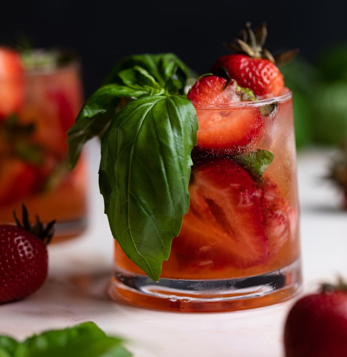 https://www.orchidsandsweettea.com/wp-content/uploads/2021/05/Strawberry-Pineapple-Basil-Mocktail-6-of-8-e1690106734811.jpg