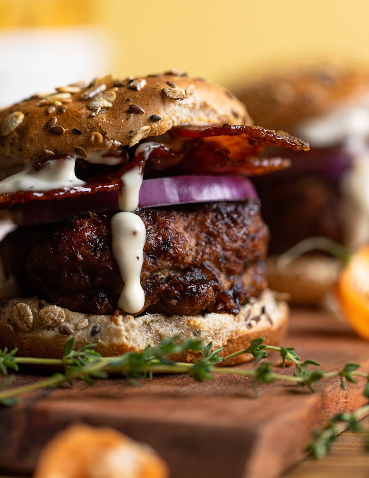 Closeup of a barbeque Jerk Bacon Turkey Burger.