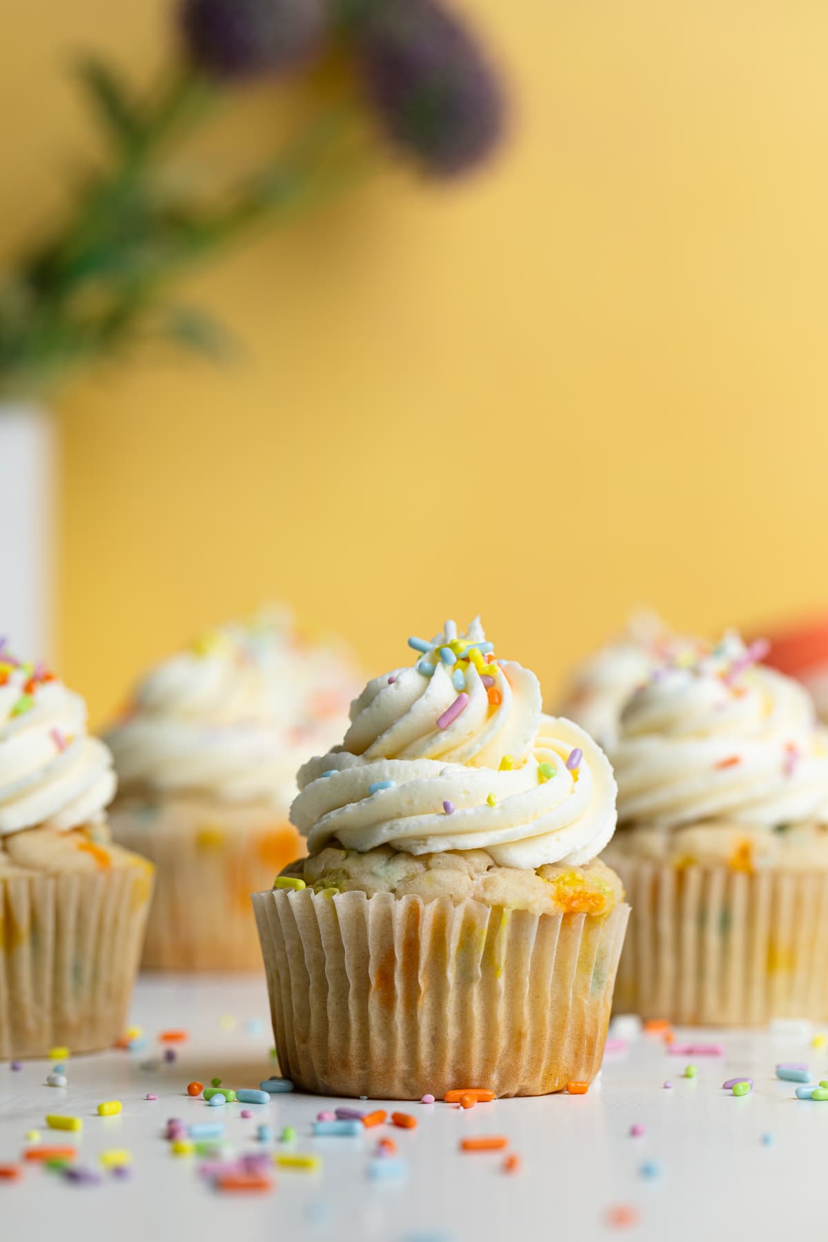 Vegan Funfetti Cupcakes on a table.