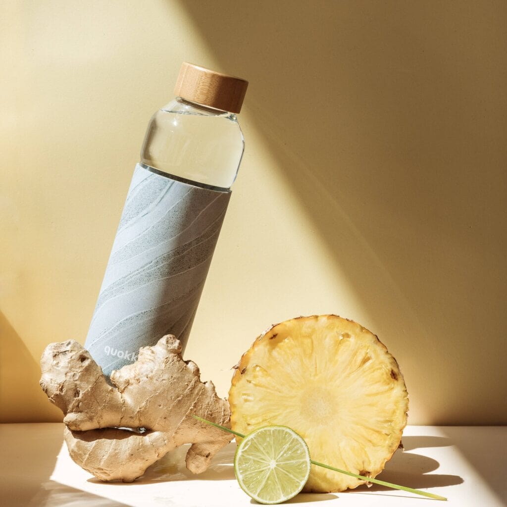 Water bottle with ginger, pineapple, and lime.