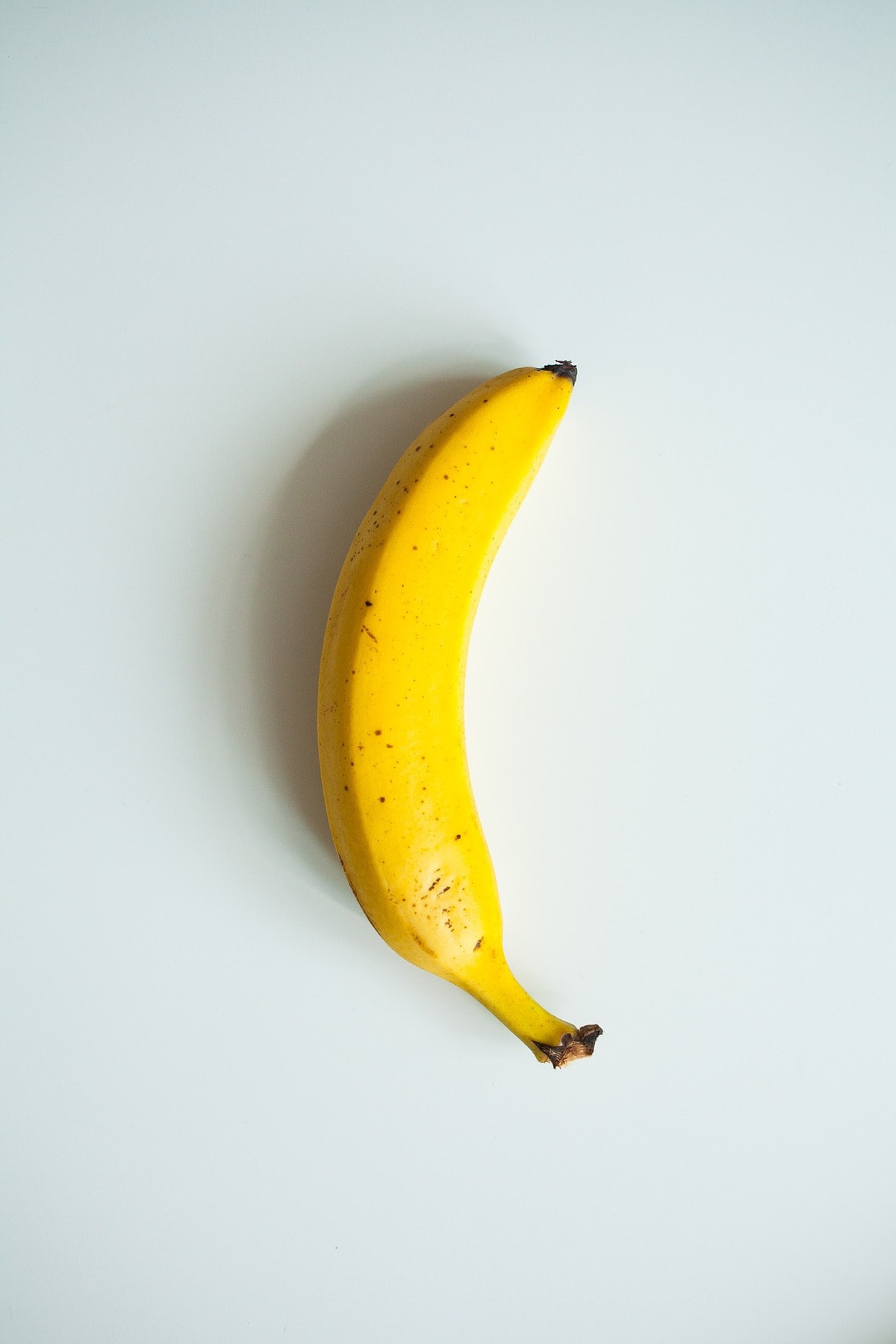 Banana on a white table.