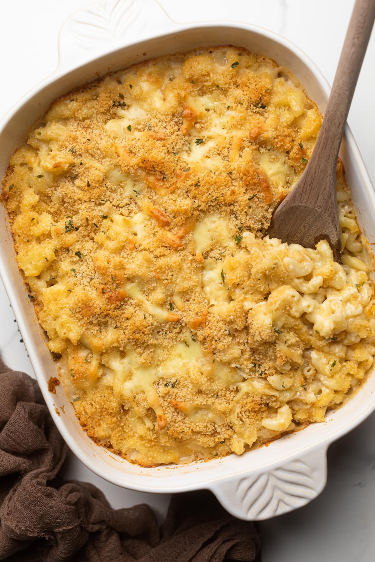Southern Baked Mac and Cheese with Breadcrumbs in a white casserole dish