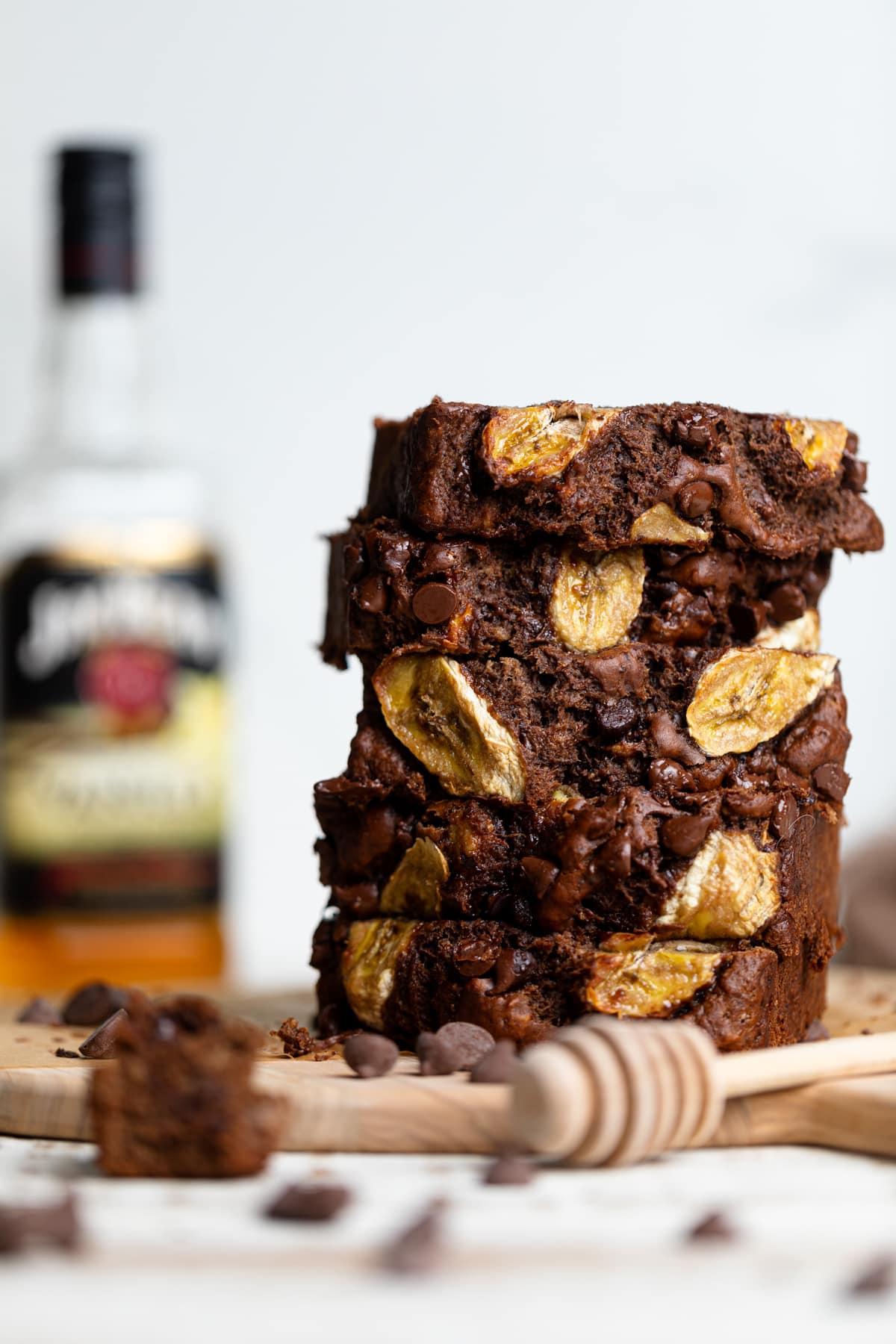 Stacked slices of Vegan Chocolate Bourbon Banana Bread.