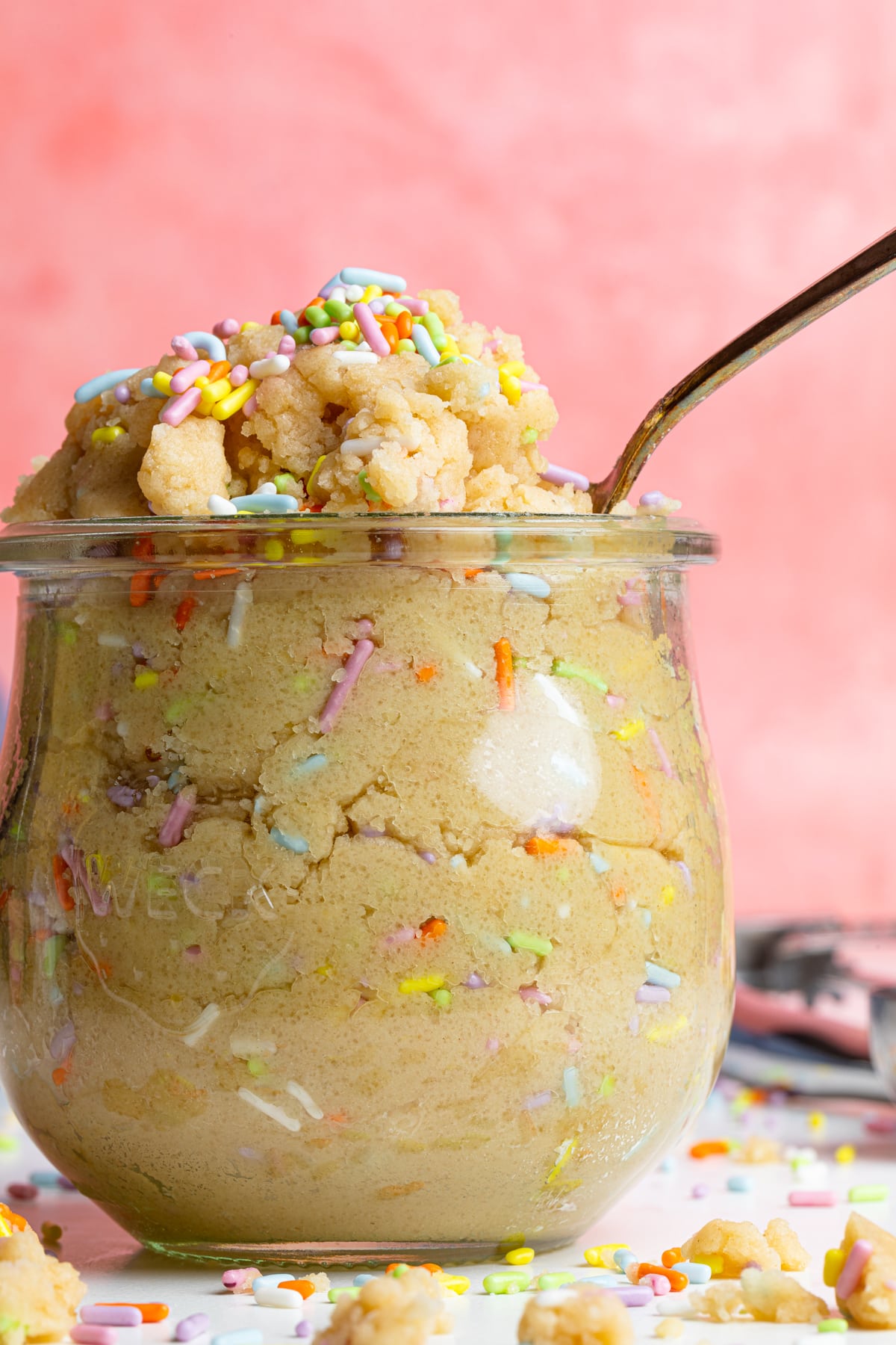 Glass full of Edible Vegan Funfetti Cookie Dough.