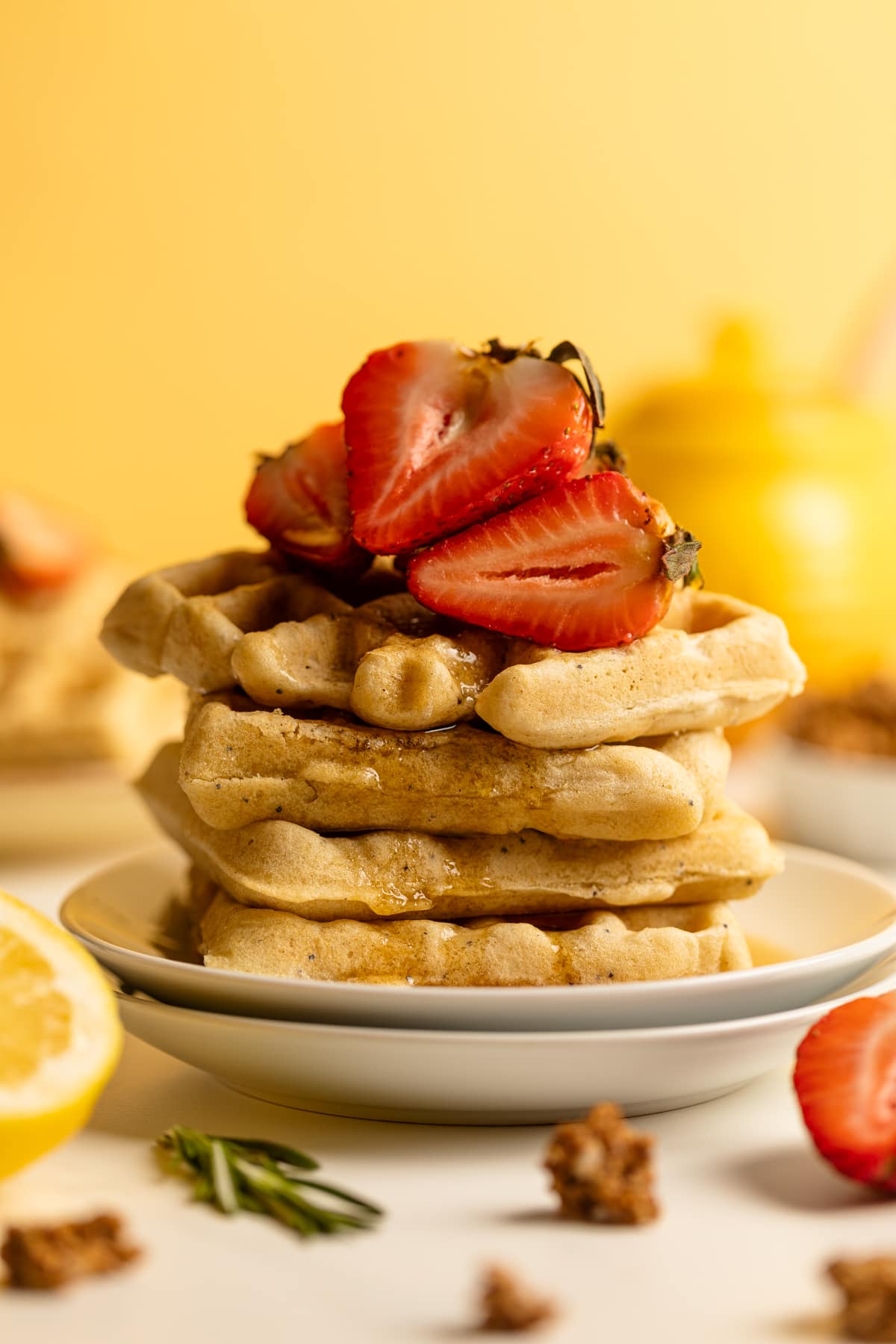 Tall stack of Gluten-Free Lemon Poppyseed Waffles.