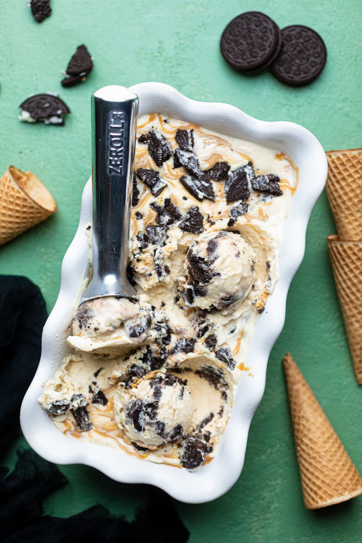 Spoon scooping No-Churn Peanut Butter Oreo Ice Cream.