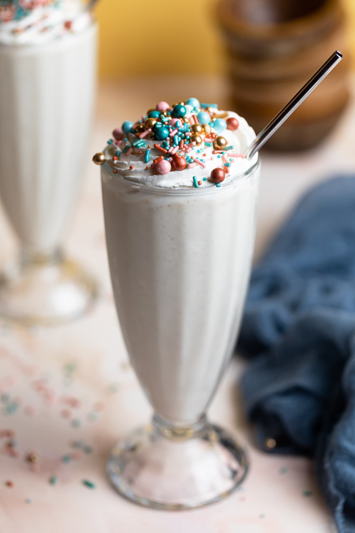 Dairy-Free Vanilla Funfetti Milkshake topped with sprinkles.