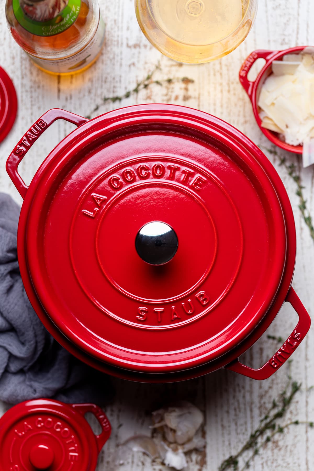 Red Staub pan with a lid.