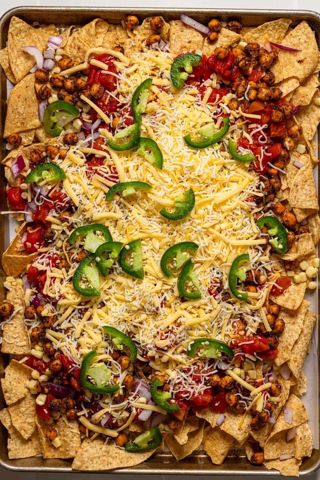 All ingredients layered on a baking sheet.