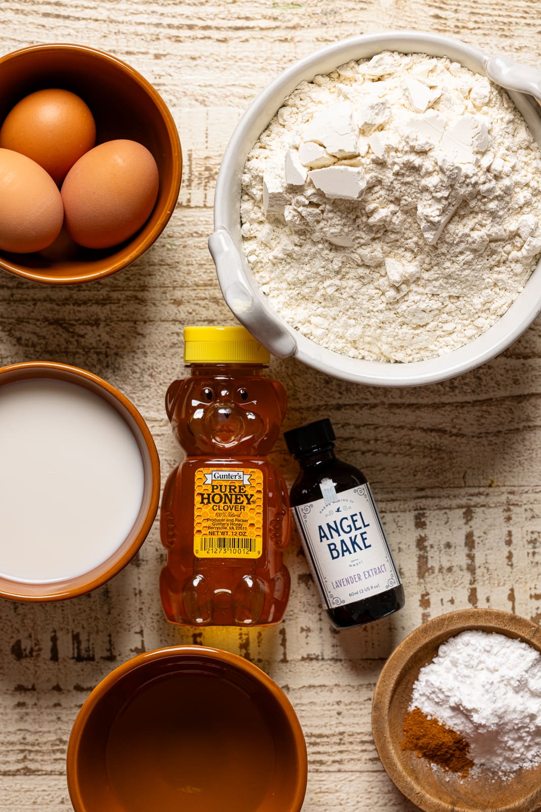 Ingredients on a white wood table.