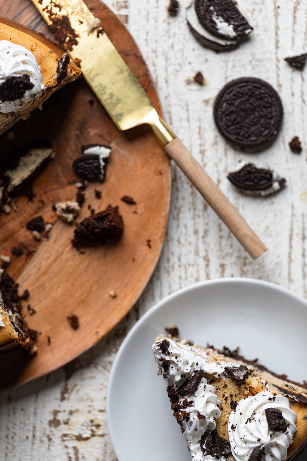 Overhead shot of Gluten-Free Peanut Butter Cookies N\' Cream Brownie Cheesecake and Oreo pieces