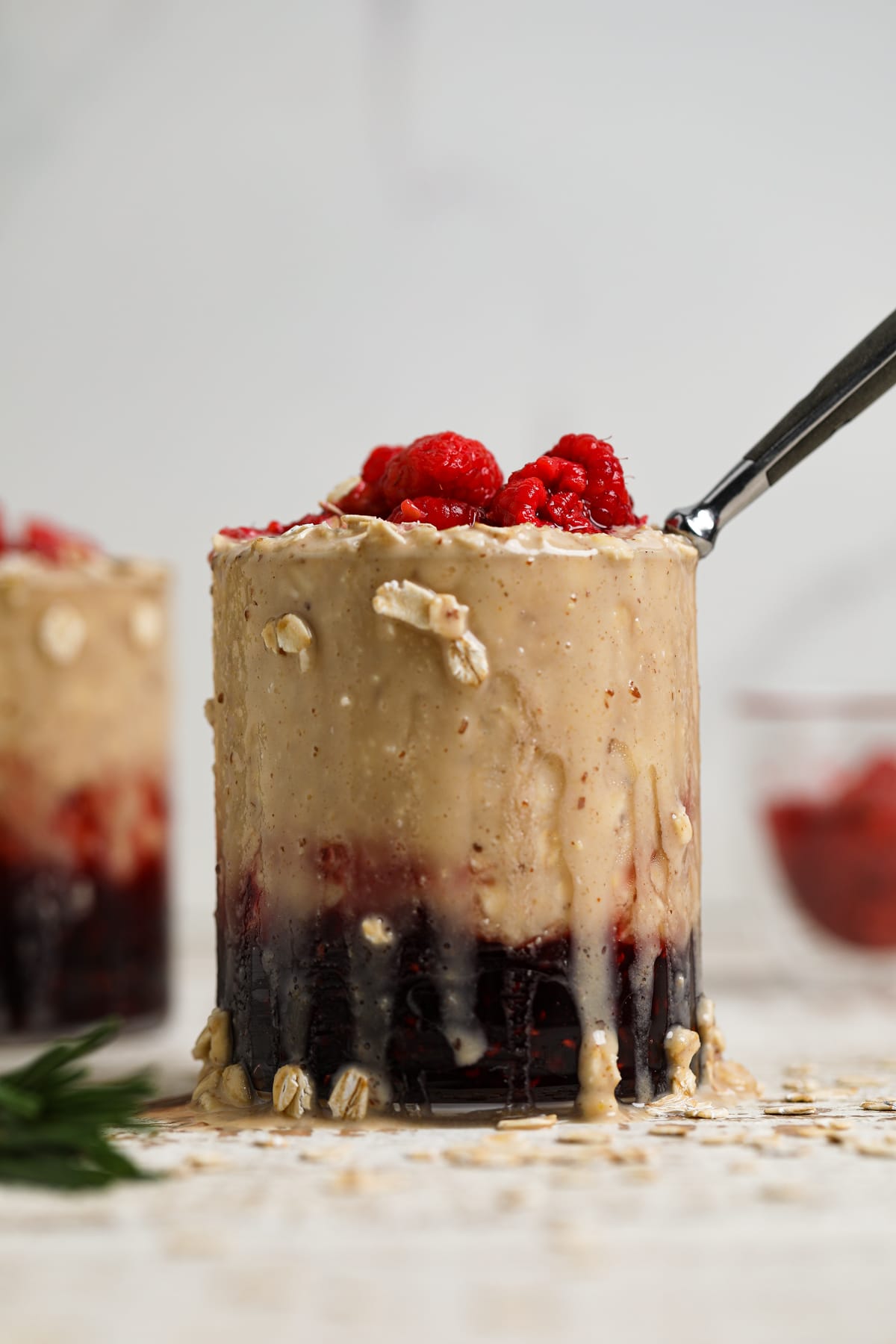 Glass of Protein Peanut Butter and Jelly Overnight Oats