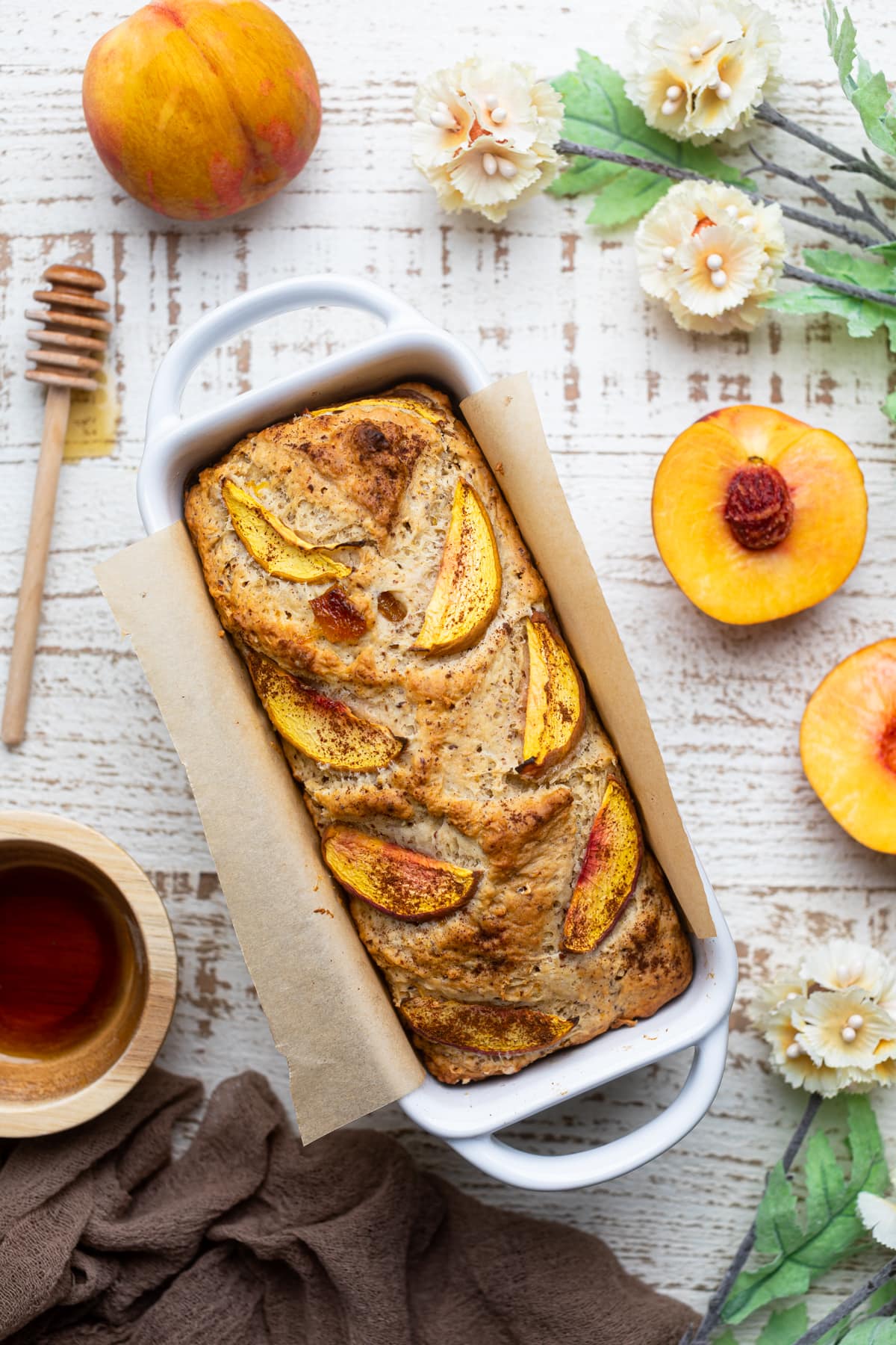 Loaf of Cinnamon Maple Peach Bread in a bread pan