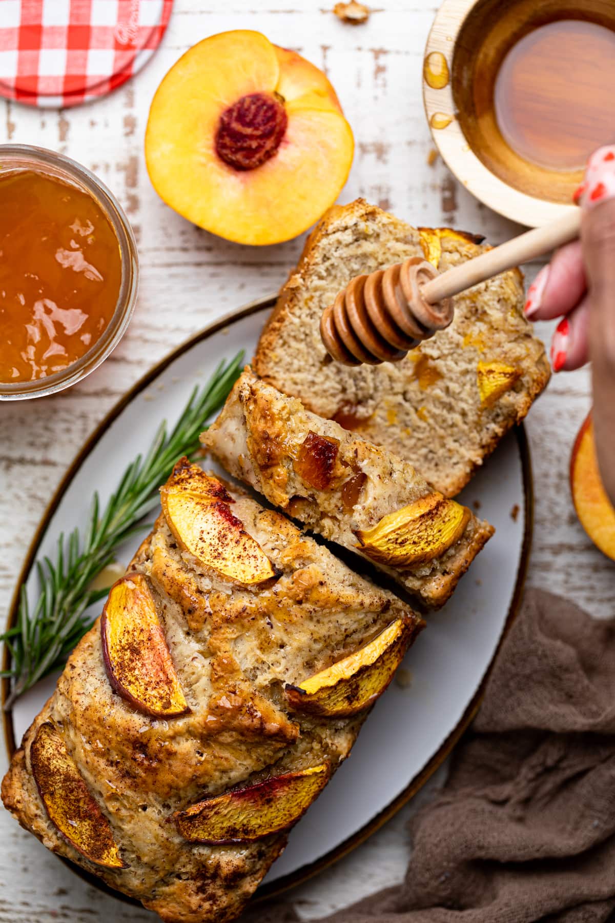 Honey drizzling onto Cinnamon Maple Peach Bread 