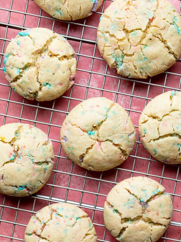 Thick and Chewy Funfetti Cookies on a wire rack