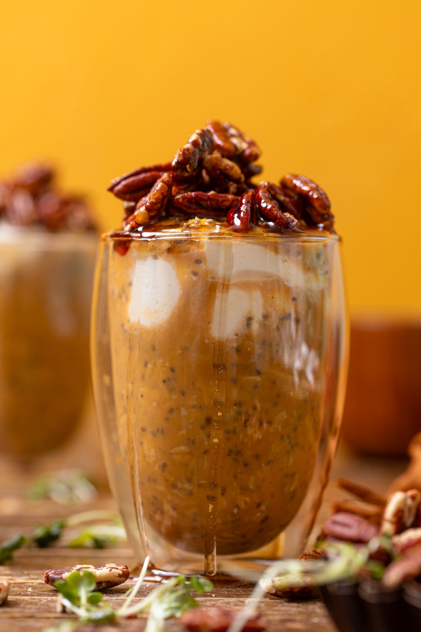 Up close shot of Sweet Potato Pie Overnight Oats in two glasses.
