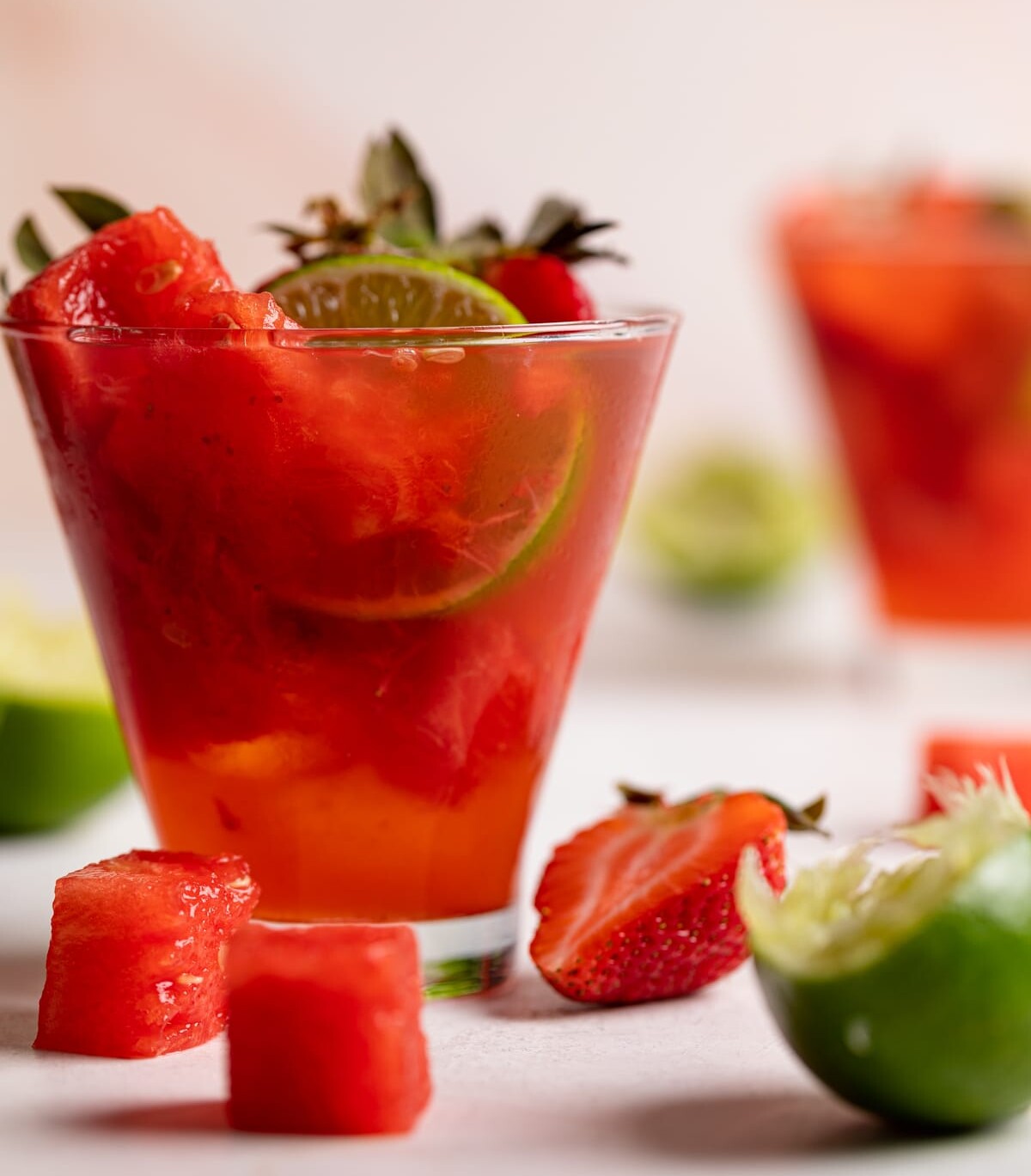 Watermelon Strawberry Lime Mocktail with fresh watermelon cubes and sliced berries.