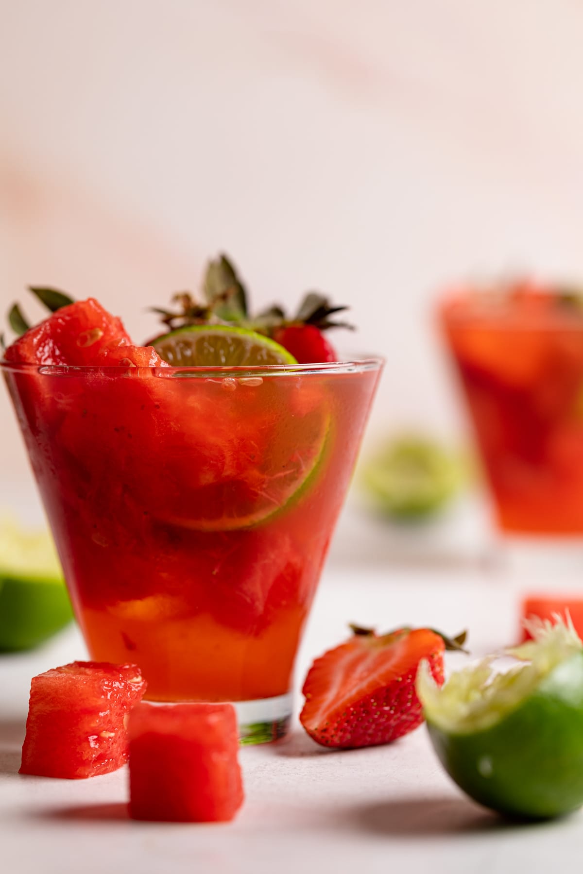 Watermelon Strawberry Lime Mocktail with fresh watermelon cubes and sliced berries.