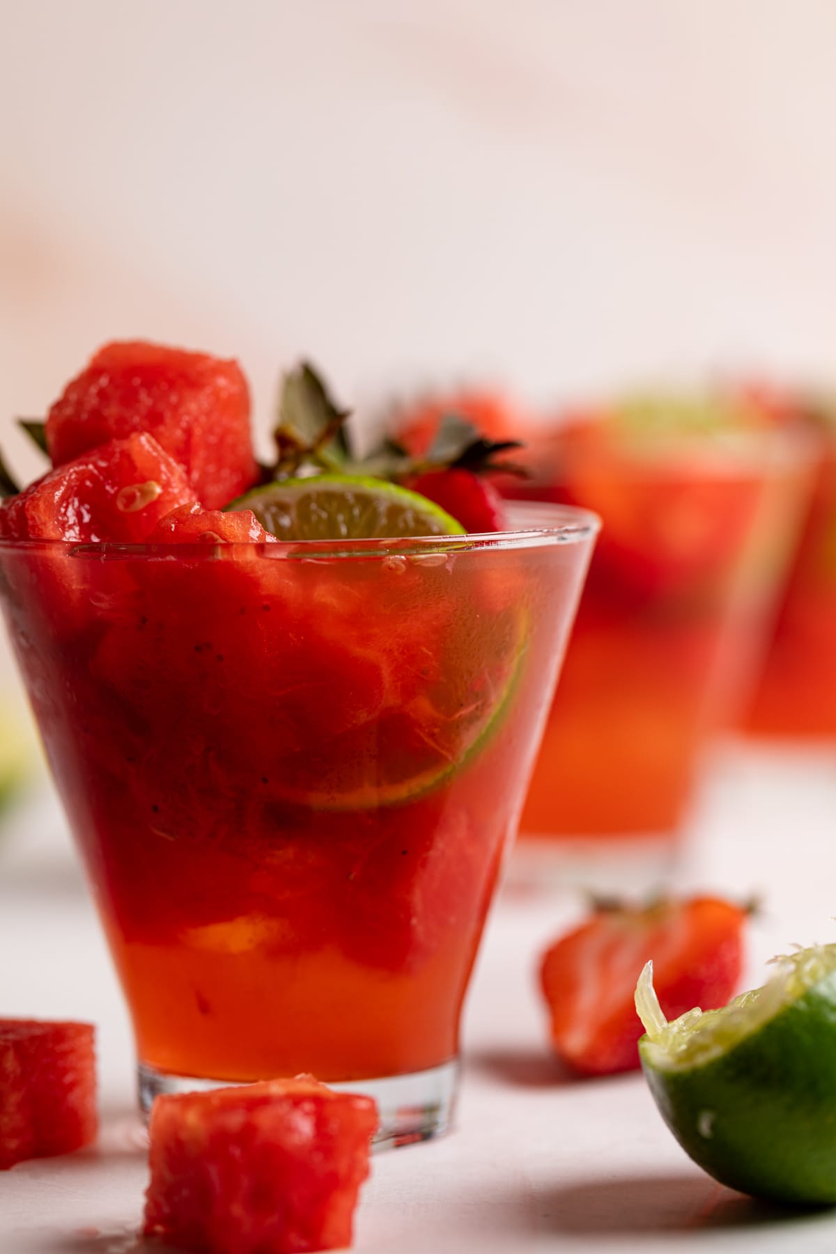 Watermelon Strawberry Lime Mocktail with fresh lime and watermelon cubes.