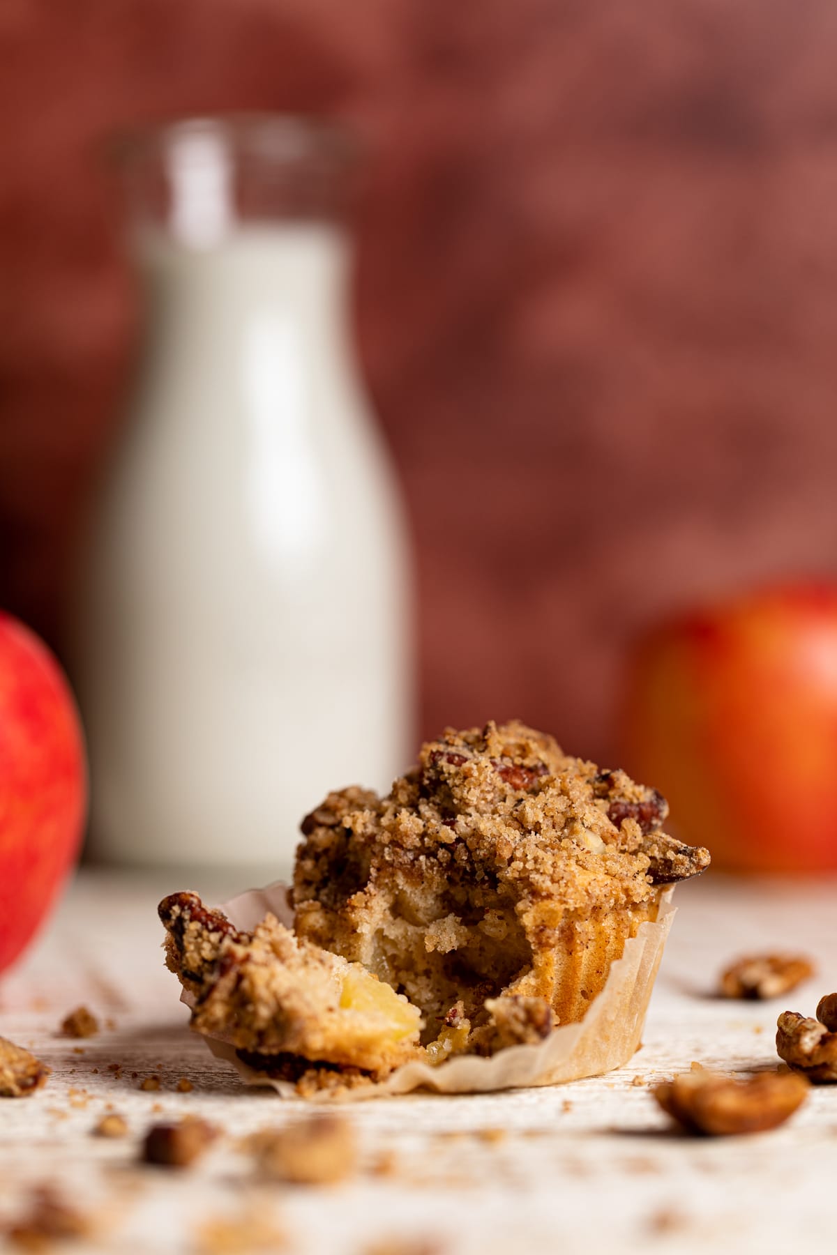 Vegan Apple Spice Muffin with a piece pulled off