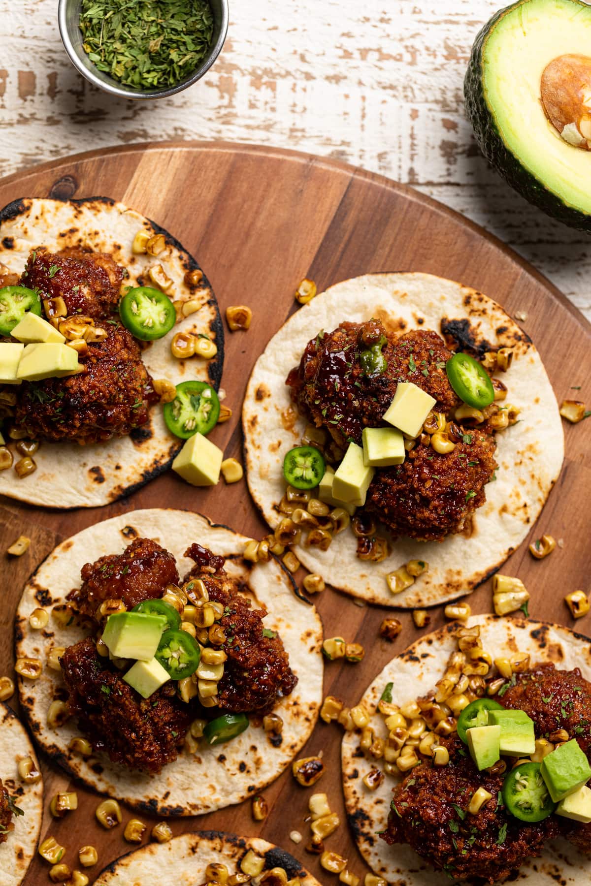 Barbeque Cauliflower Tacos on a wooden board