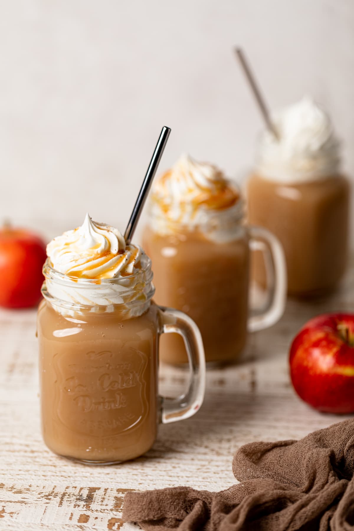 Line of Caramel Apple Cider Drinks in handled mason jars