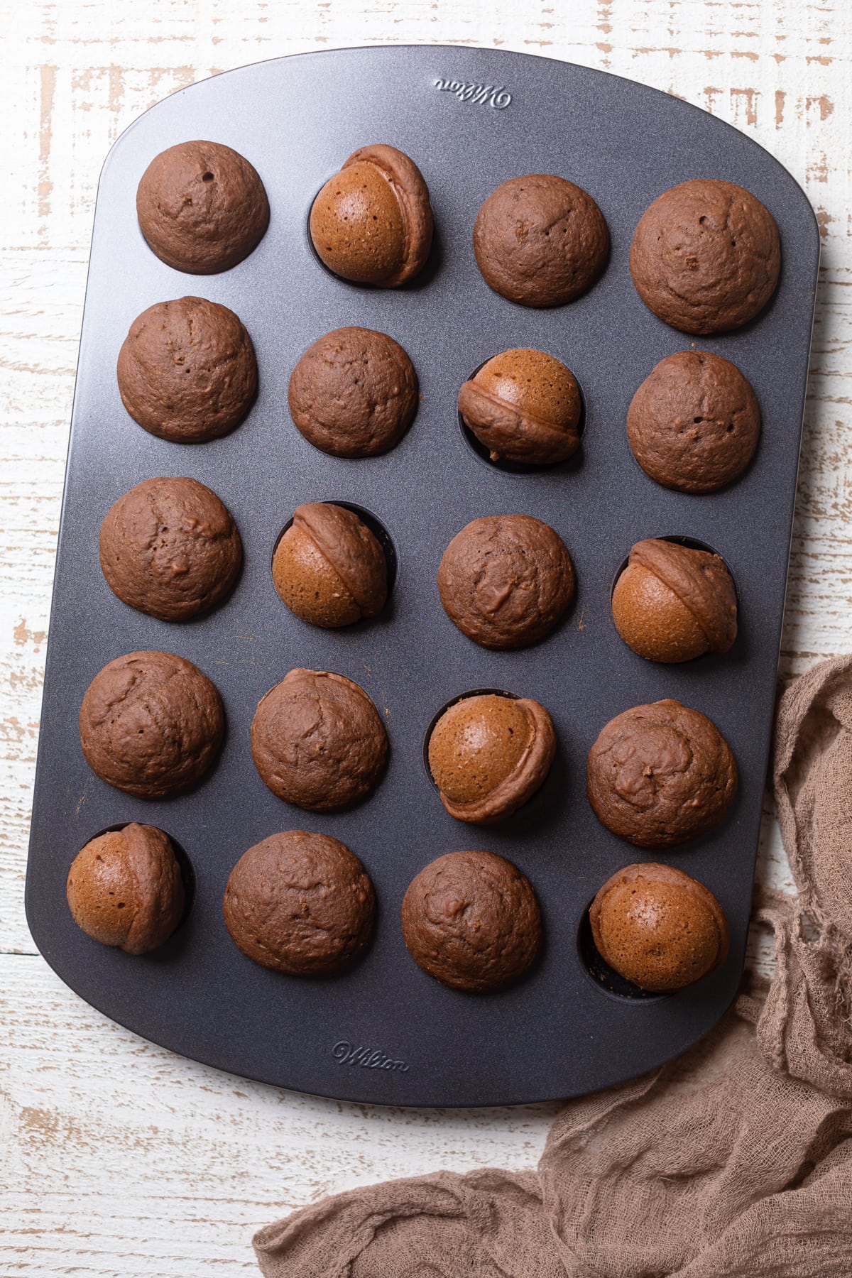 Vegan Chocolate Donut Holes in a donut hole pan