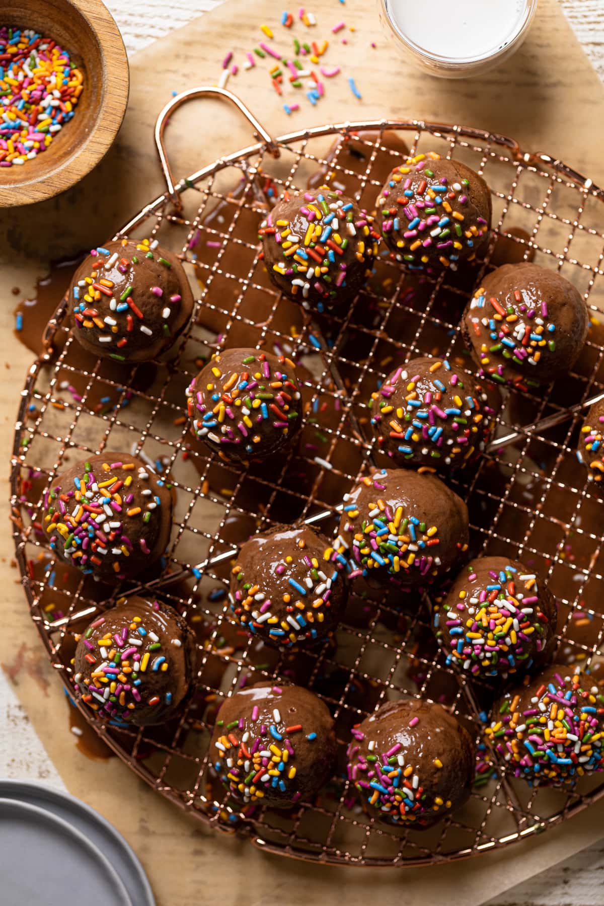 Vegan Chocolate Donut Holes on a wire rack