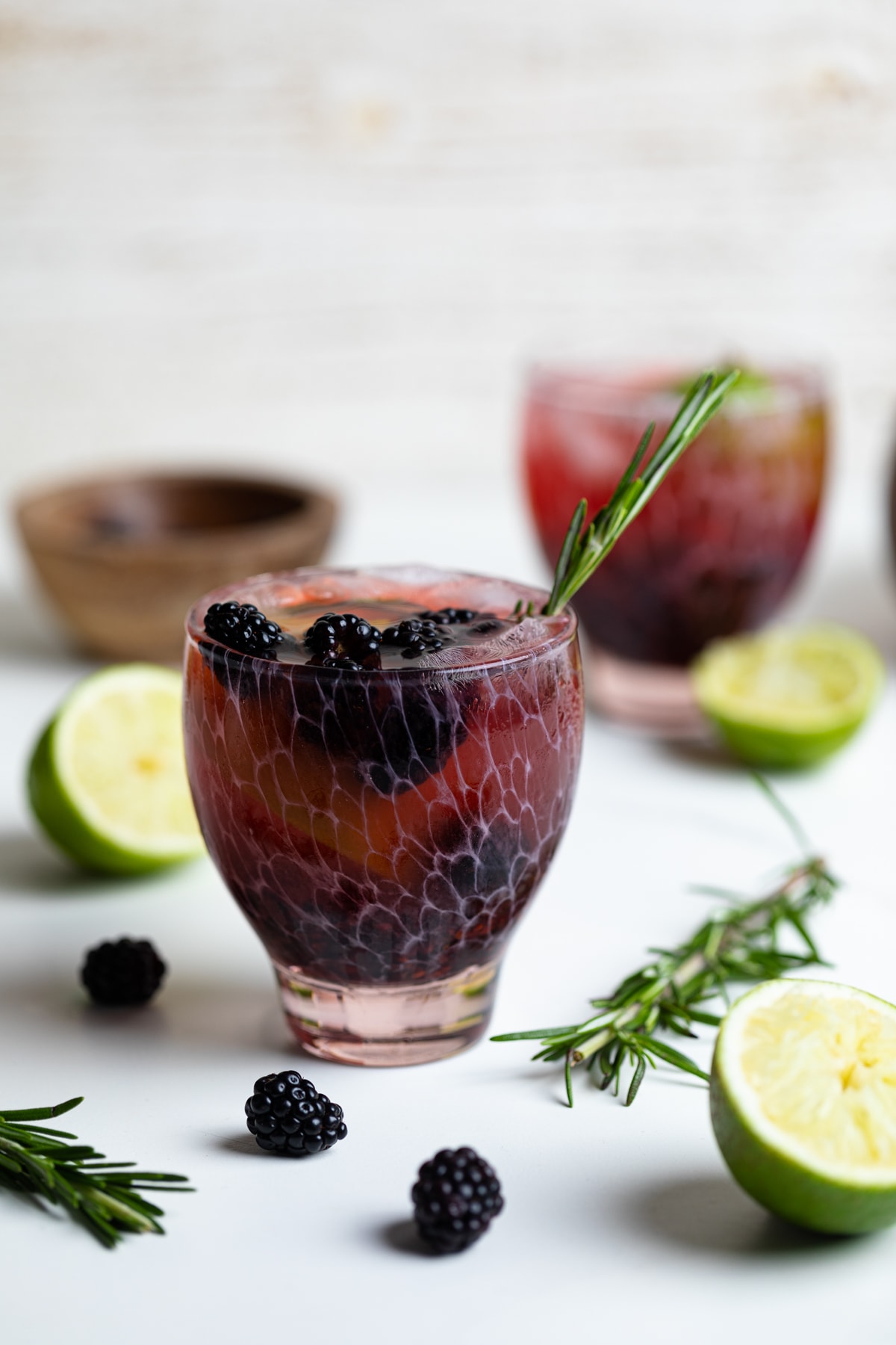 Blackberry Lime Mocktail stuffed with blackberries, lime wedges, and ice
