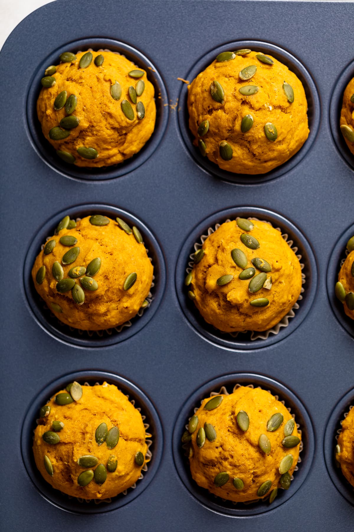 Vegan Pumpkin Spice Muffins in a muffin pan