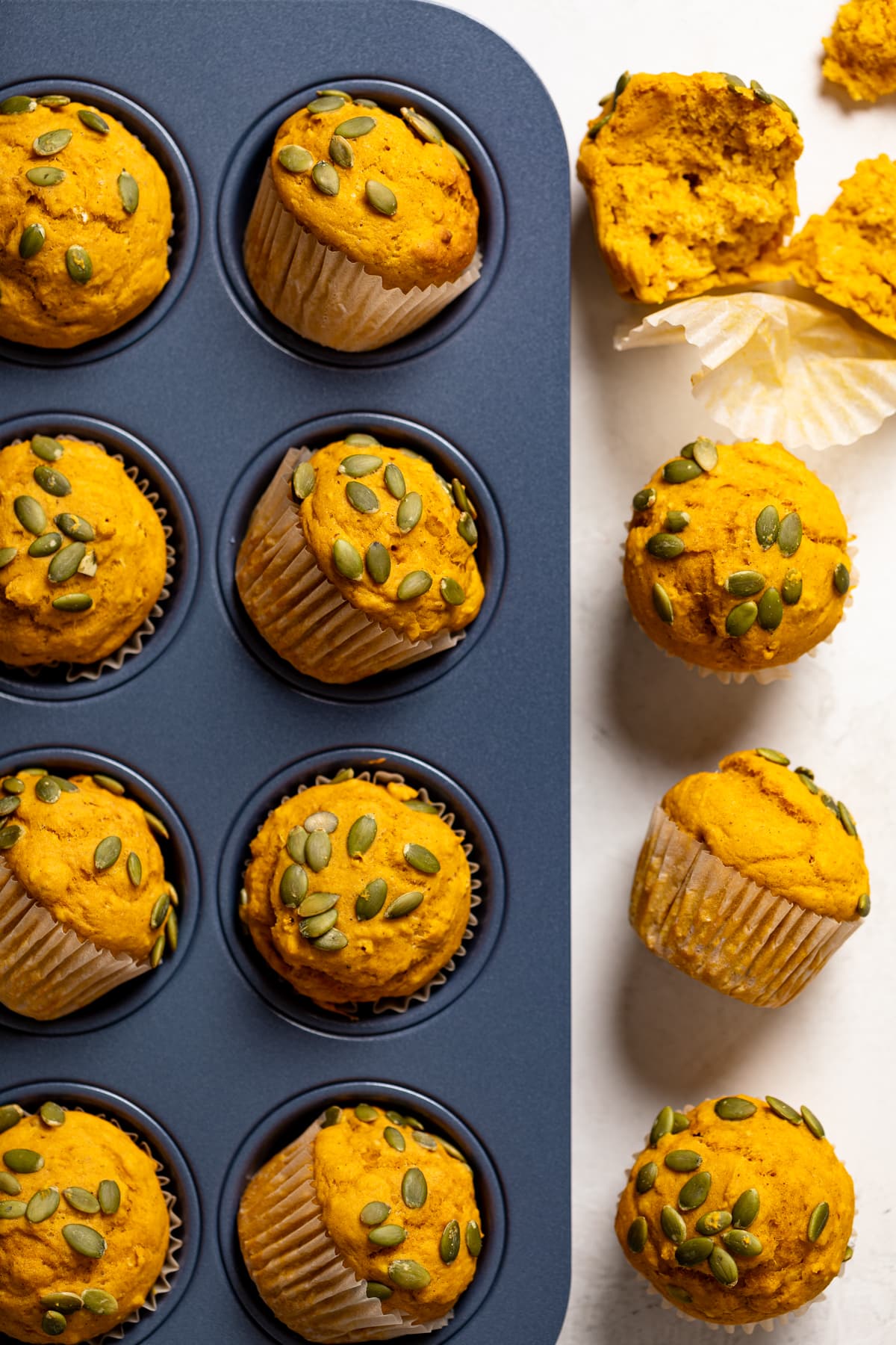 Vegan Pumpkin Spice Muffins in and out of a muffin pan