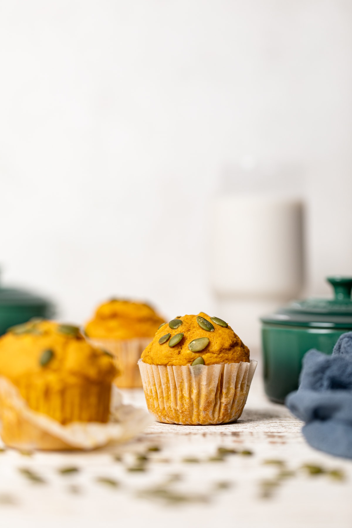 Vegan Pumpkin Spice Muffins on a white table