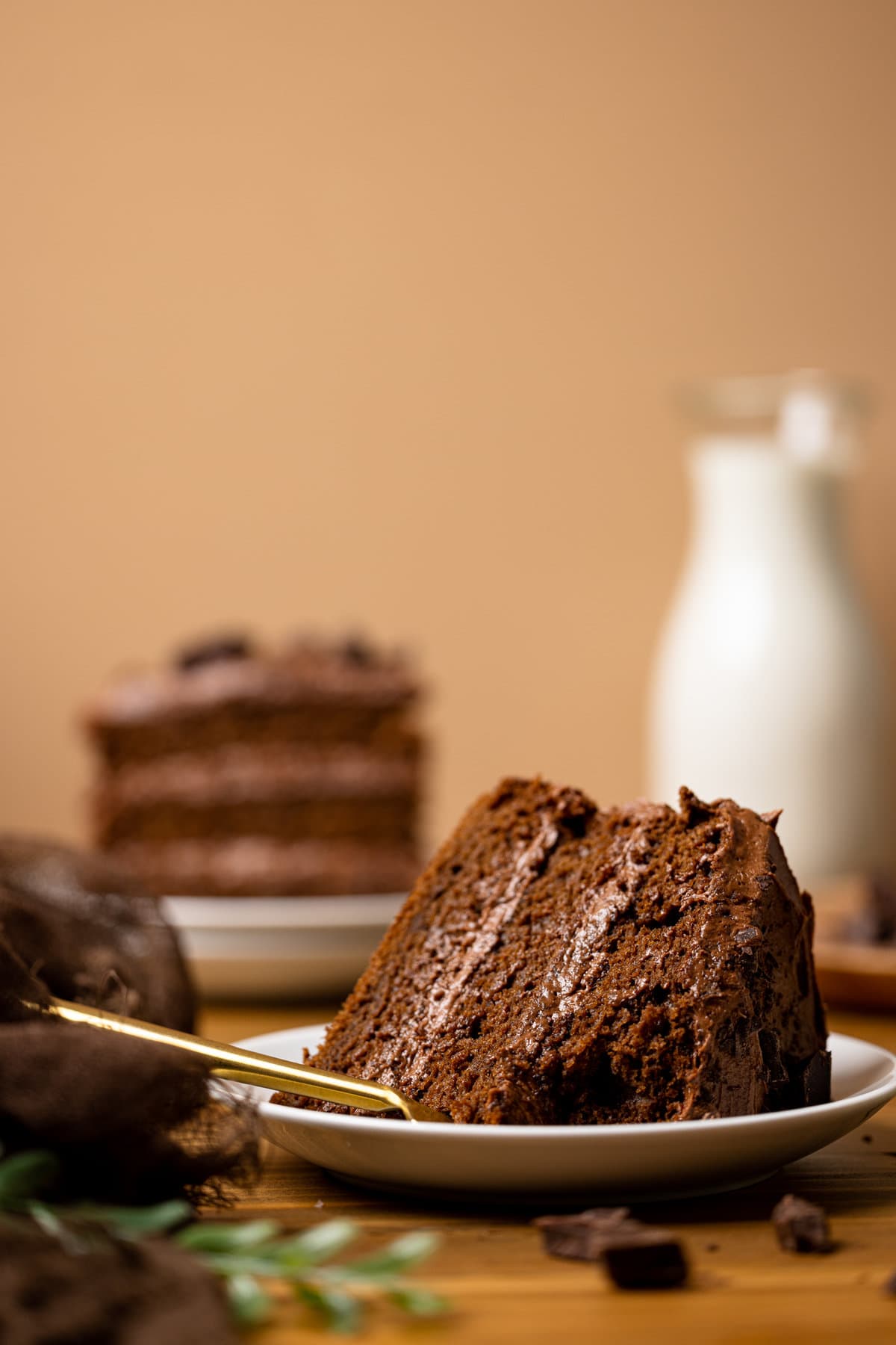 Slice of Vegan Chocolate Cake missing a bite