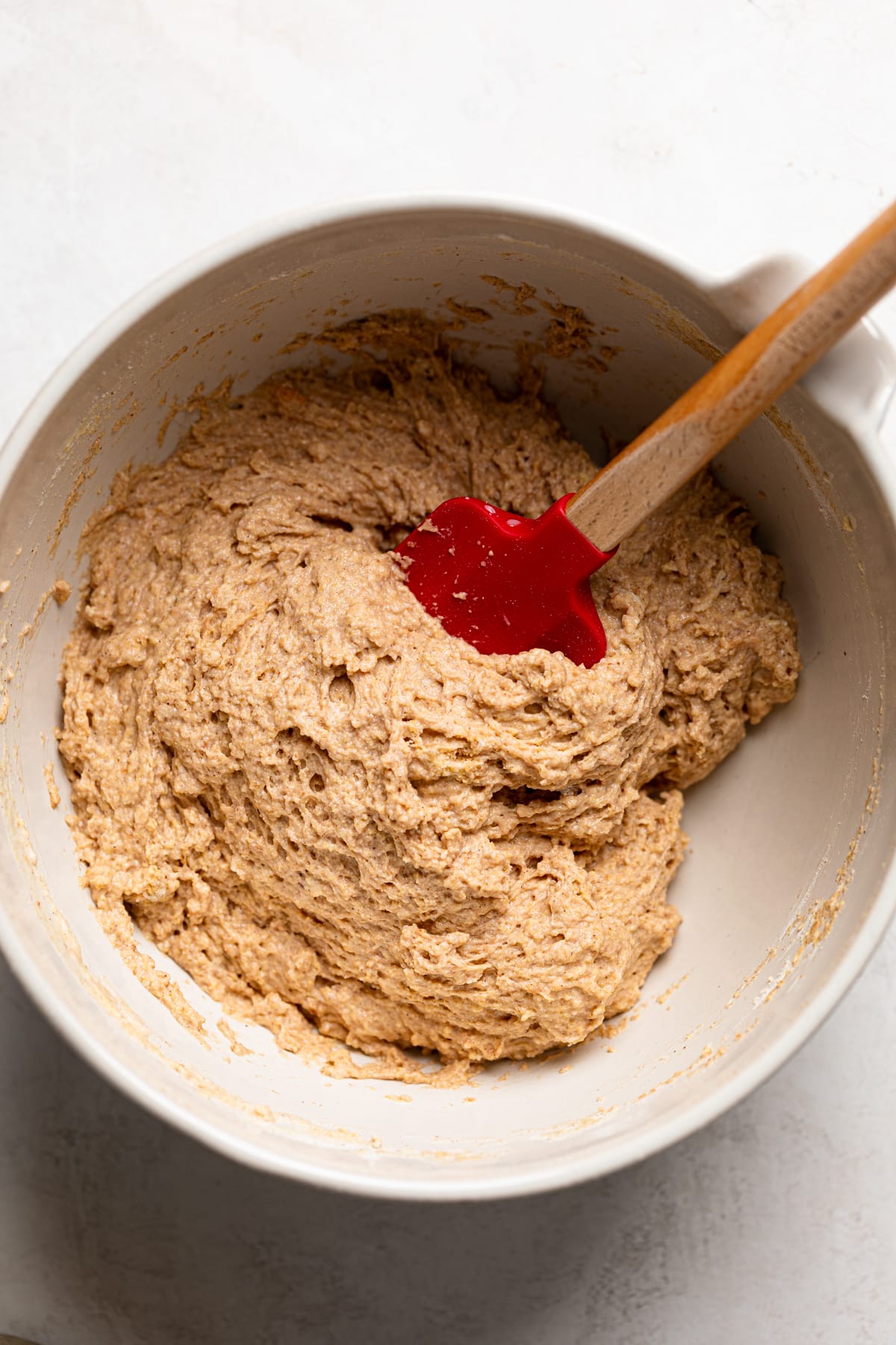 Apple Spice Cornmeal Waffle batter in a bowl