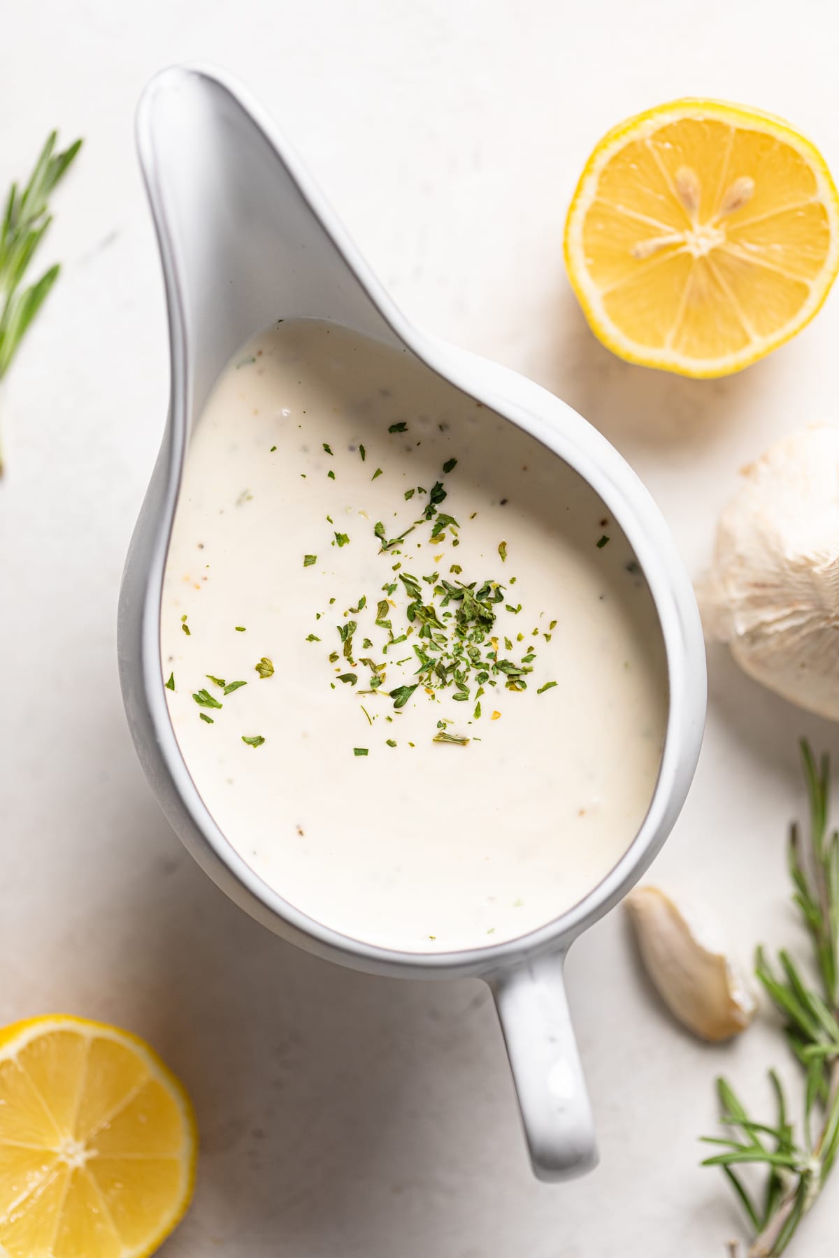 Gravy bowl of dairy-free lemon-garlic dressing