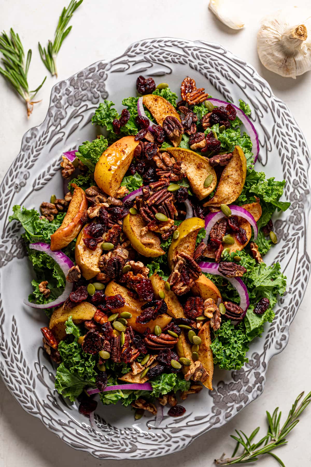 Fall Harvest Apple Kale Salad on a decorative serving bowl