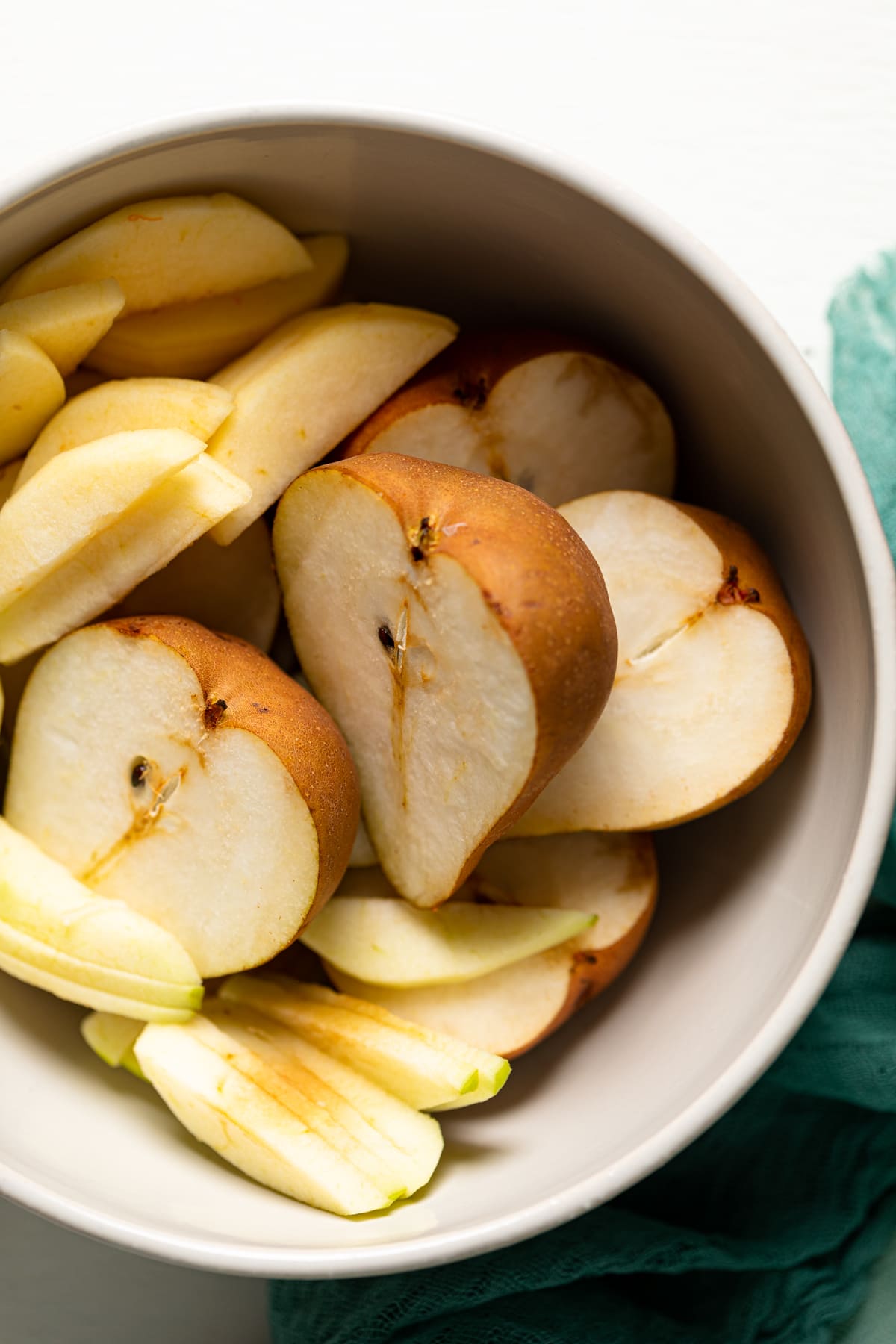Bowl of pear halves and slices