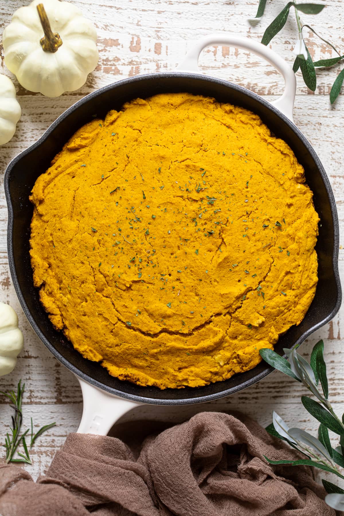 Brown Butter Pumpkin Cornbread in a skillet