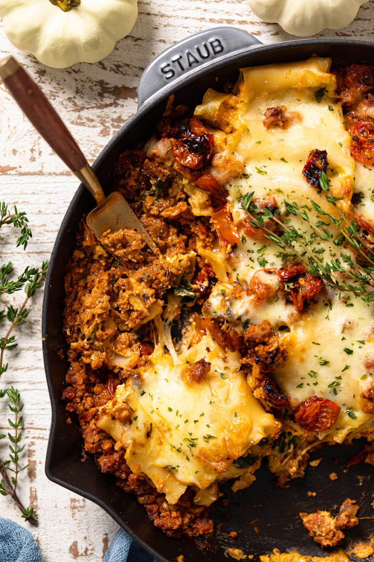 Fork in a skillet of Meatless Pumpkin Lasagna