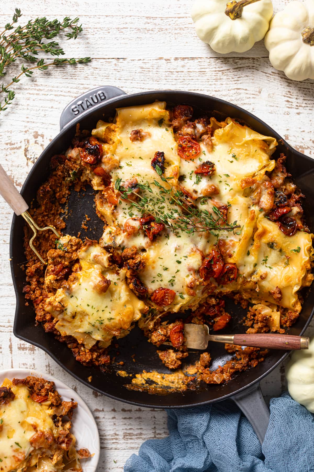 Half-served Meatless Pumpkin Lasagna in a skillet