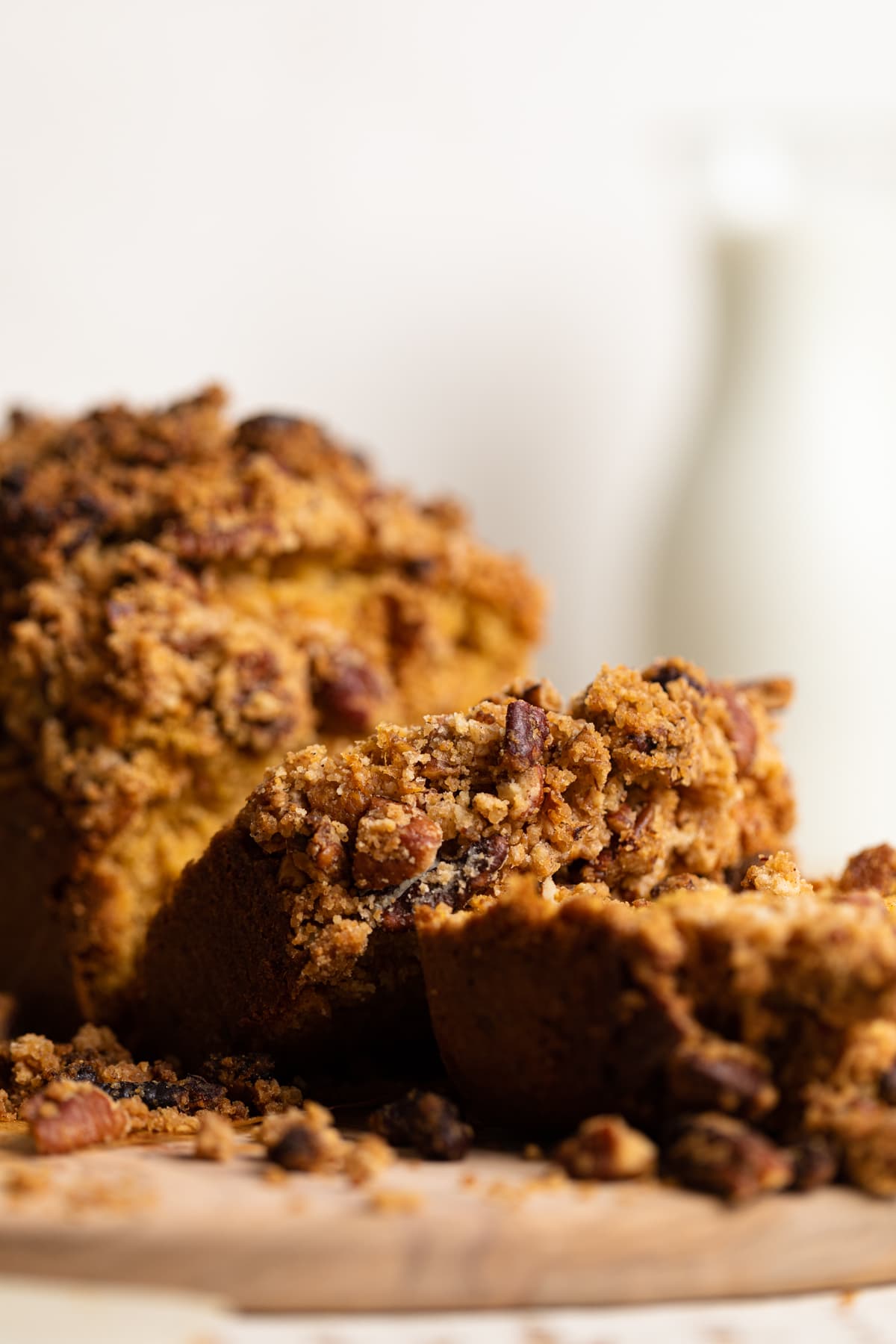 Sliced Vegan Sweet Potato Crumble Bread on a wooden board