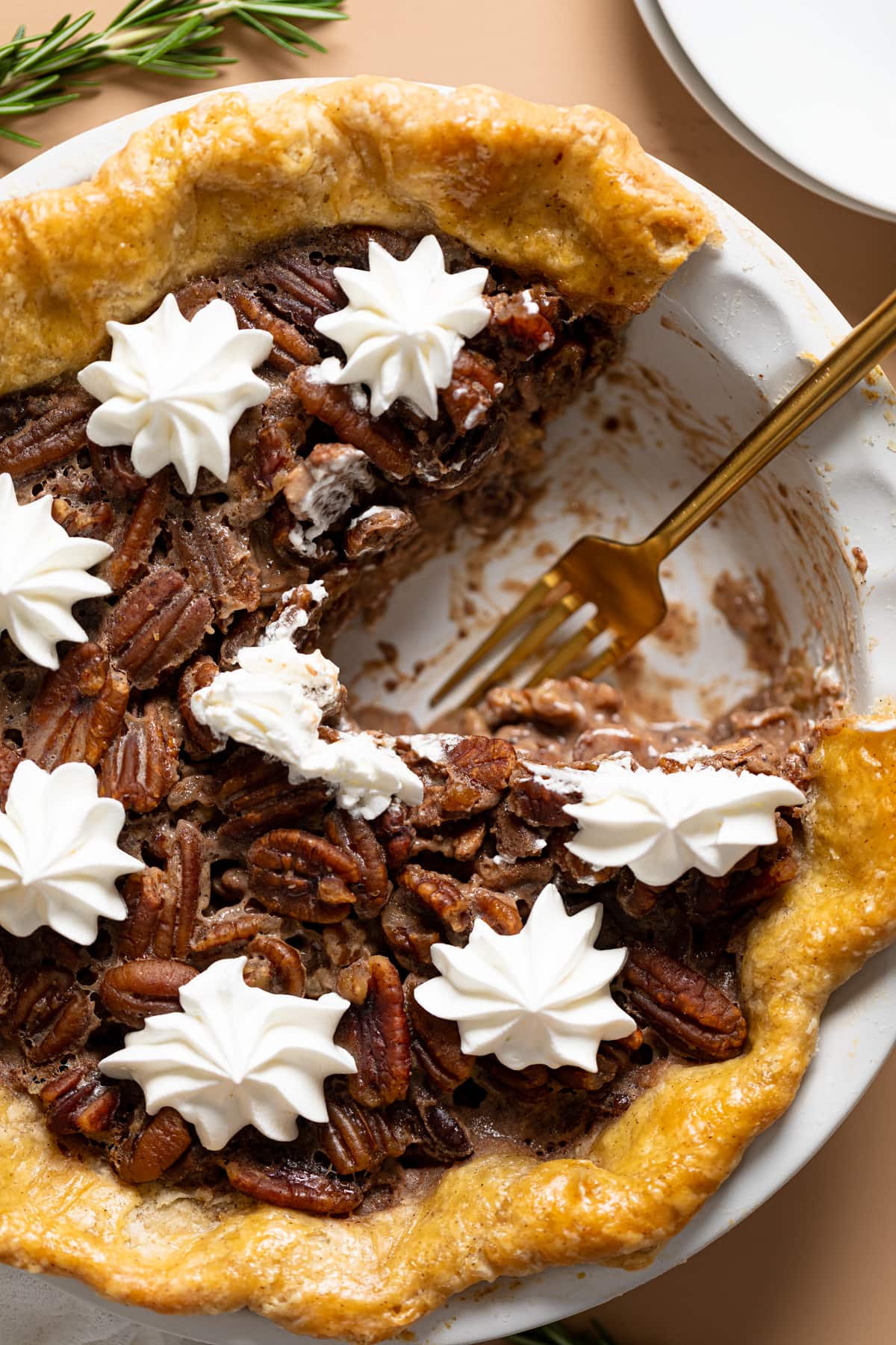 Fork where a slice is missing from a Vegan Southern Bourbon Pecan Pie