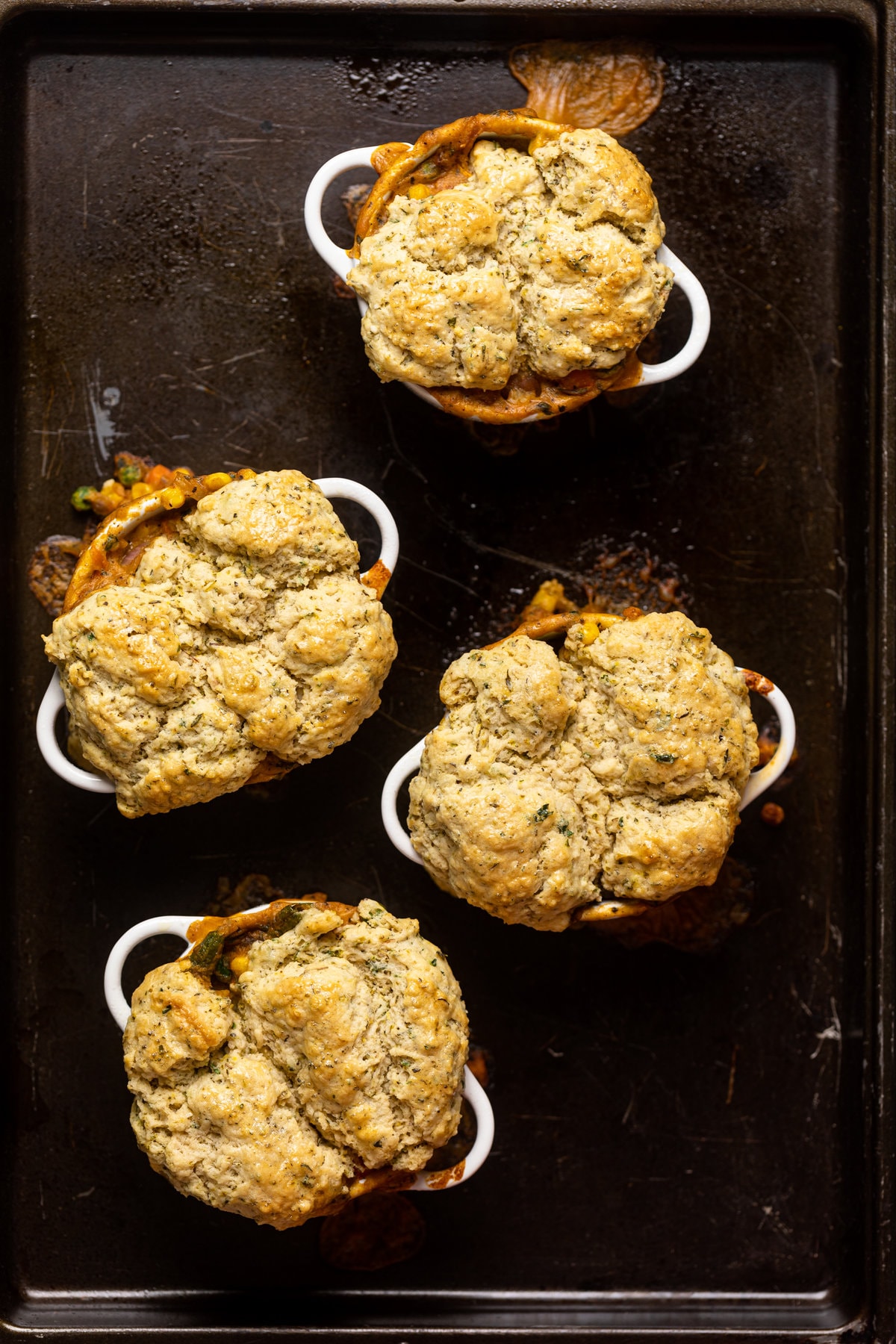 Mini ramekins of Herb Biscuit topping. The ultimate vegan comfort food