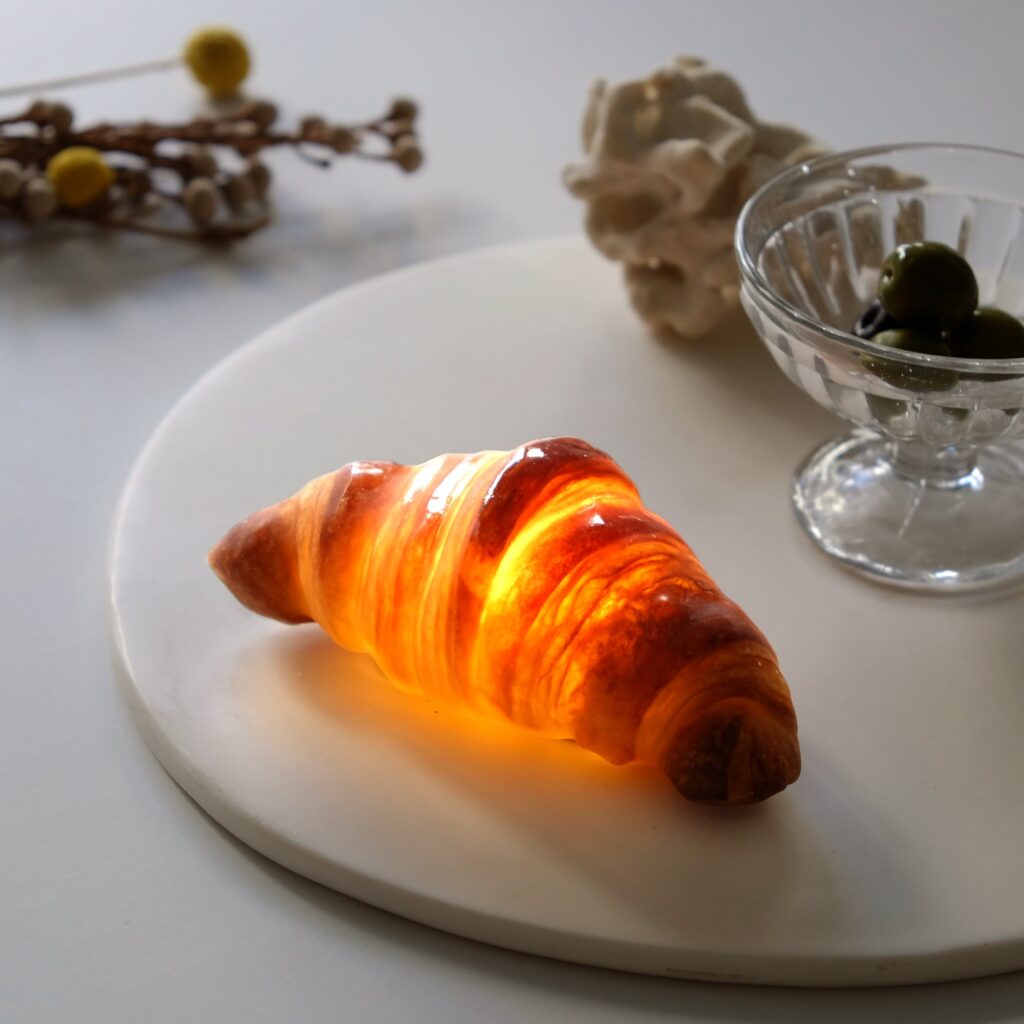 Lamp in the shape of a croissant