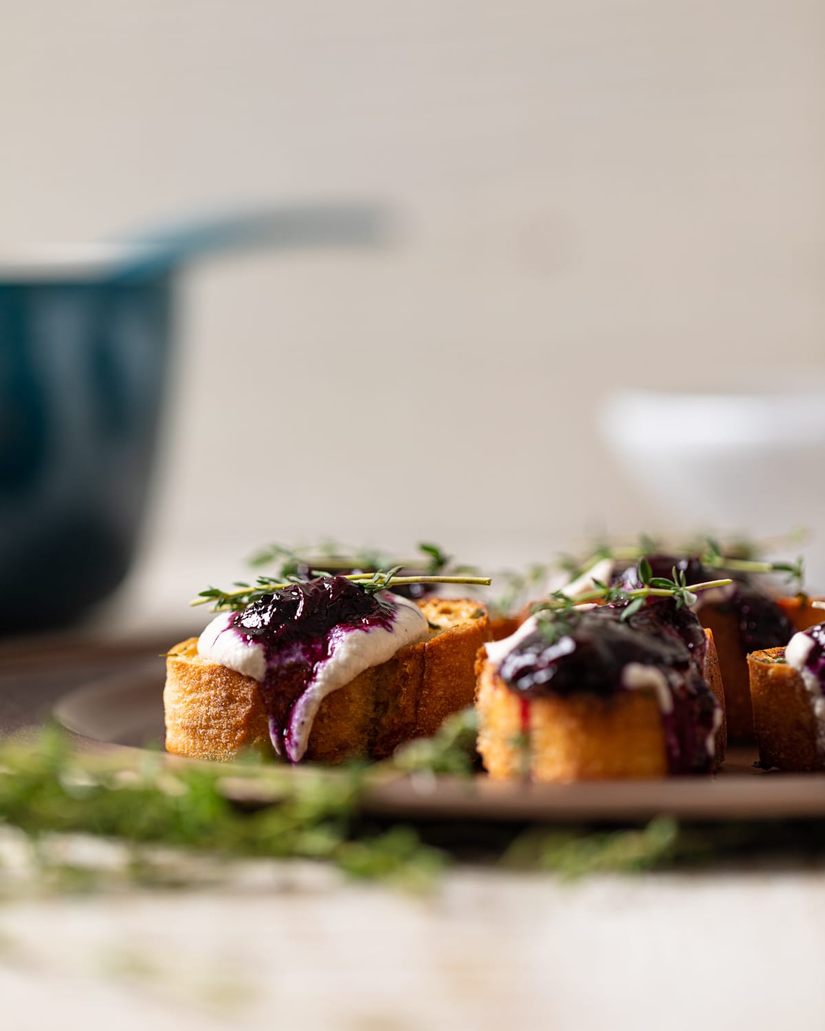 Vegan Blueberry Crostinis topped with thyme